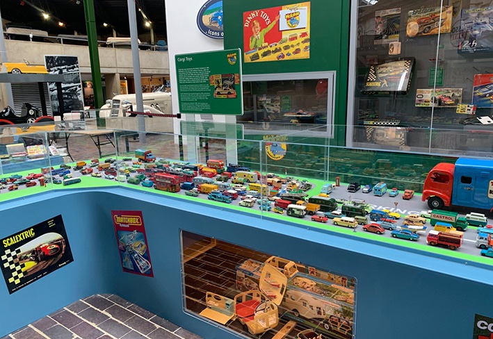 Recently completed project for National Motor Museum, Beaulieu.  Motoring in Miniature includes construction of Transporter to display collection of pedal cars, roadway structure to create a fun way to display extensive model car collection plus all supporting graphic elements