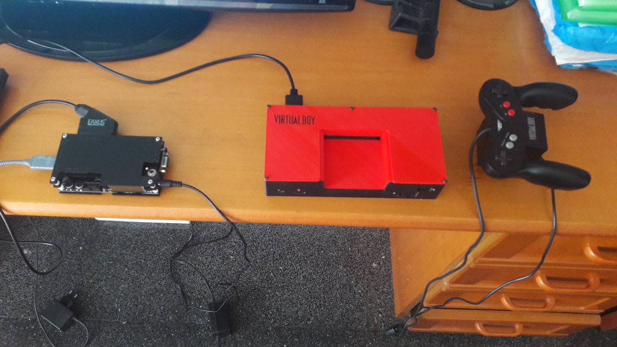Batossai84's tweet photo. @VirtualBoyFans @RetroFun_ @Nintendork9 @asobitech @RetroGamerDaz @gamesyouloved @DestinyFomo @TopHatGamingMan @frazer_HX @retro_respawn @RetroGamersClub My virtualboy game collection and my consolized virtualboy. I also have a normal virtual boy with the blockbuster case, but no photos of it on my phone right now :P https://t.co/jeDwefVJgS