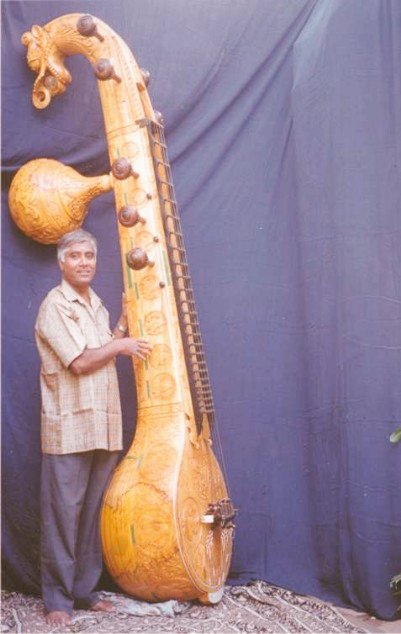 World's Largest Veena called as Mahasarvabhowma Veena dedicated and placed at  #Shringeri Sharadamba Peetam,  #KarnatakaGuru Nivas - 11-06-2003. This veena is made of single wood, first of its8kind in the world.