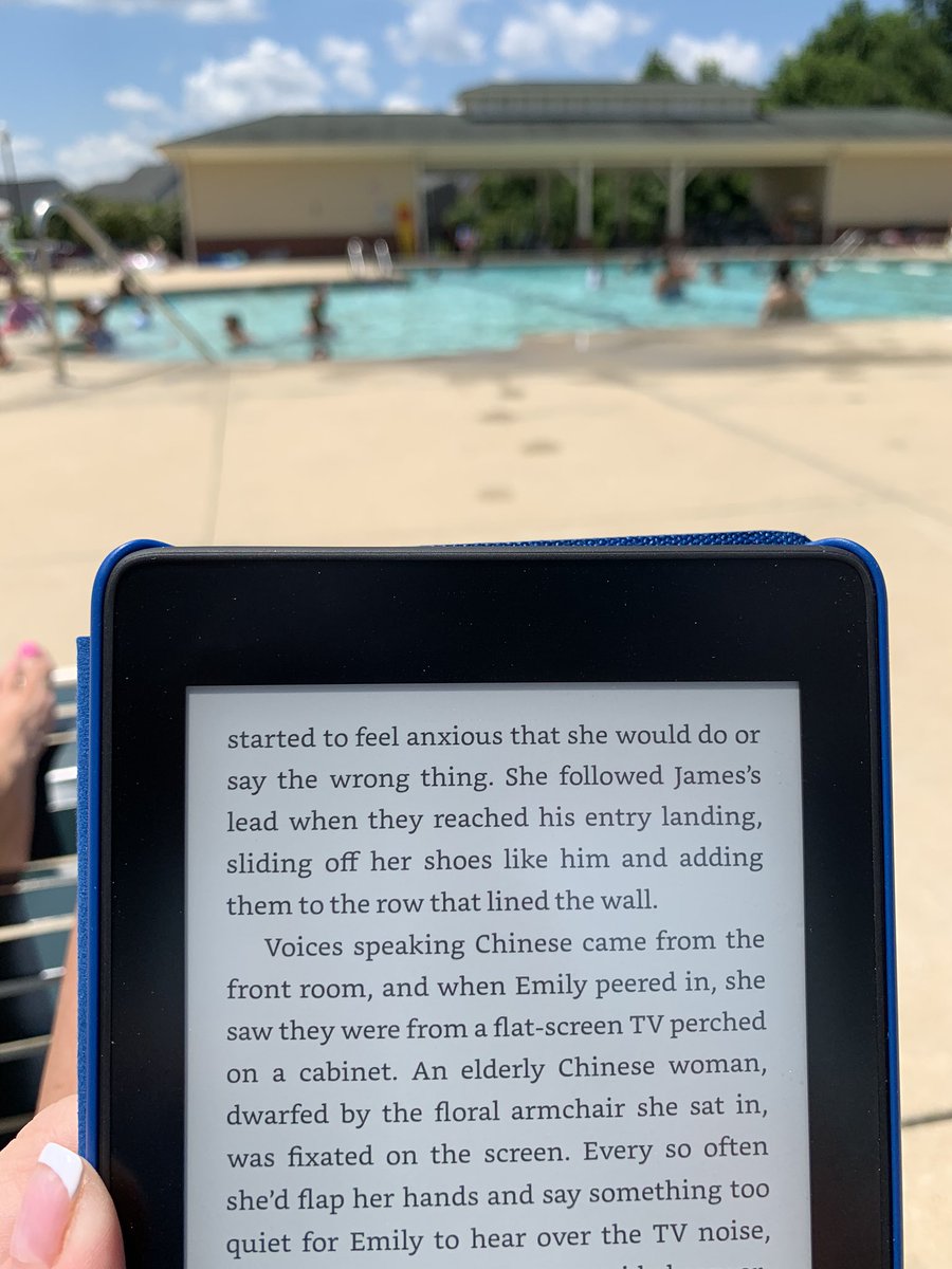 Reading an ebook poolside. Teachers, and media coordinators😄, sure do love their summers😁!