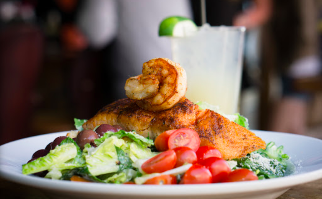 Who could resist our Blackened Shrimp &amp; Salmon Caesar Salad! 😍 Order yours exclusively down at the Pub today!