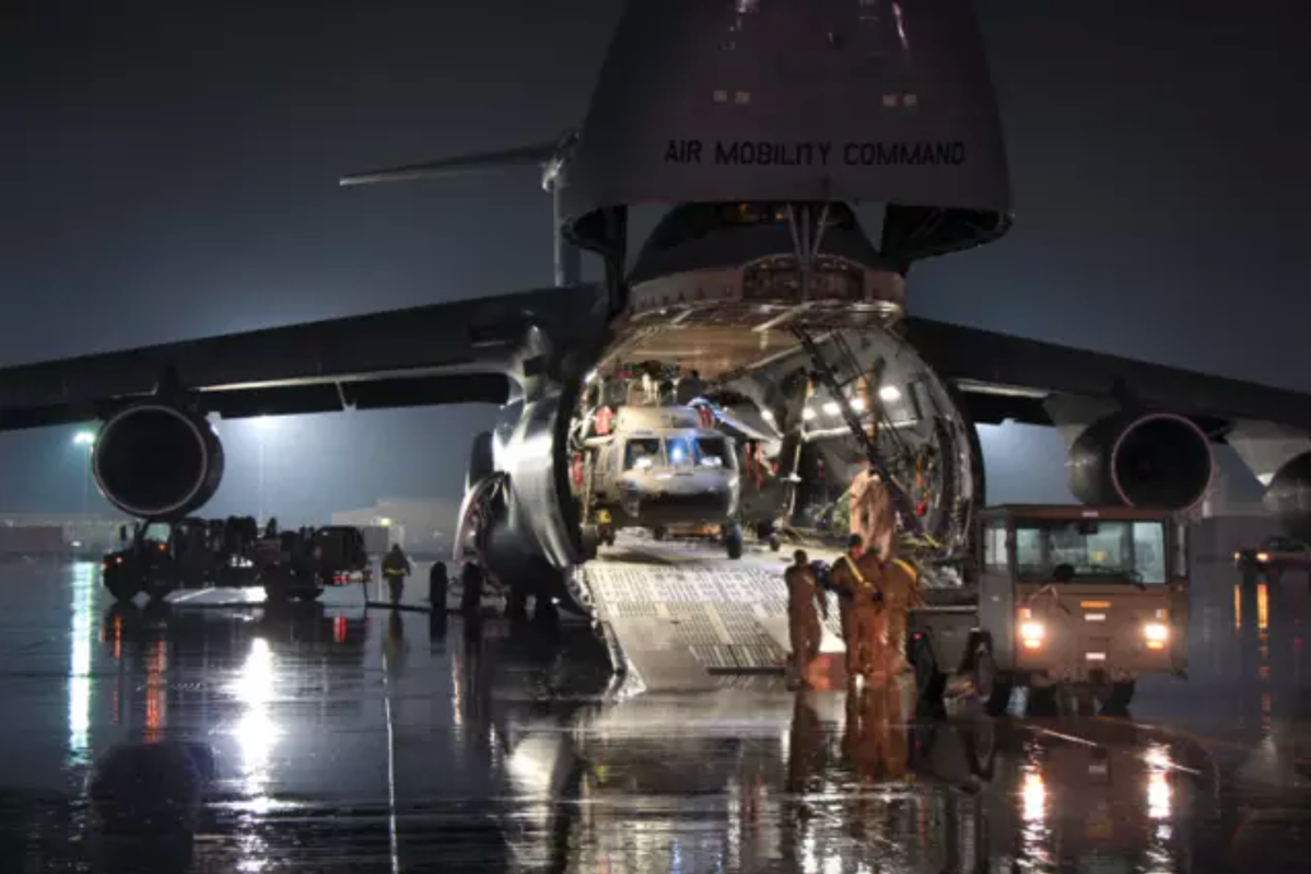 The C-5 is the largest airlifter in the US Air Force fleet. The craft can carry a combat-ready military unit anywhere in the world, as well as delivering the necessary supplies to support the unit.
