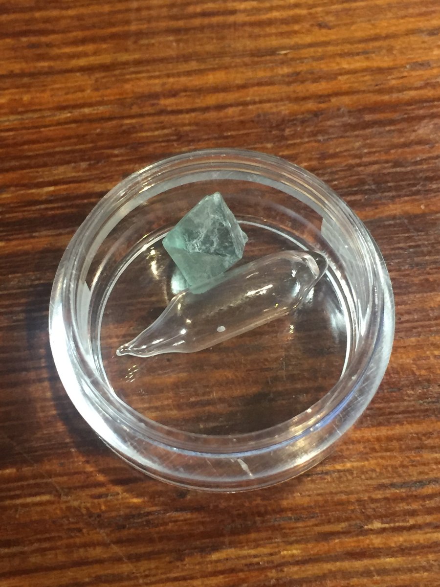 Fluorine  #elementphotos. Ampoule contains 33% F2 in He. Or at least it did at some stage; elemental fluorine is incredibly reactive so I'm rather sceptical about how much is left. Crystal is Fluorite (CaF2).