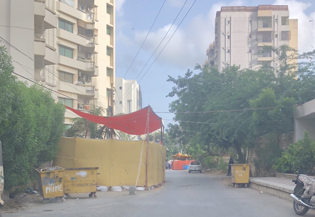 AminAyesha's tweet photo. Where does one complain about this? It is absolutely unethical to block half the road for 10 or more days in any given year, as it is. In a pandemic situation, it is or should be at least, downright criminal. ⁦@CommissionerKhi⁩ ⁦@murtazawahab1⁩ https://t.co/27XgA7SgXR