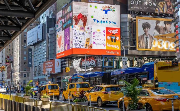 ArtsBrevard's tweet photo. #WellnessWednesday Three kids got the surprise of a lifetime when their artwork appeared on a billboard in NYC, as a giant thank you to frontline workers. The winning designs were chosen out of 450+ works of art that were submitted for Shutterfly’s #CreateThanks campaign. https://t.co/TEwyK9ZOOm