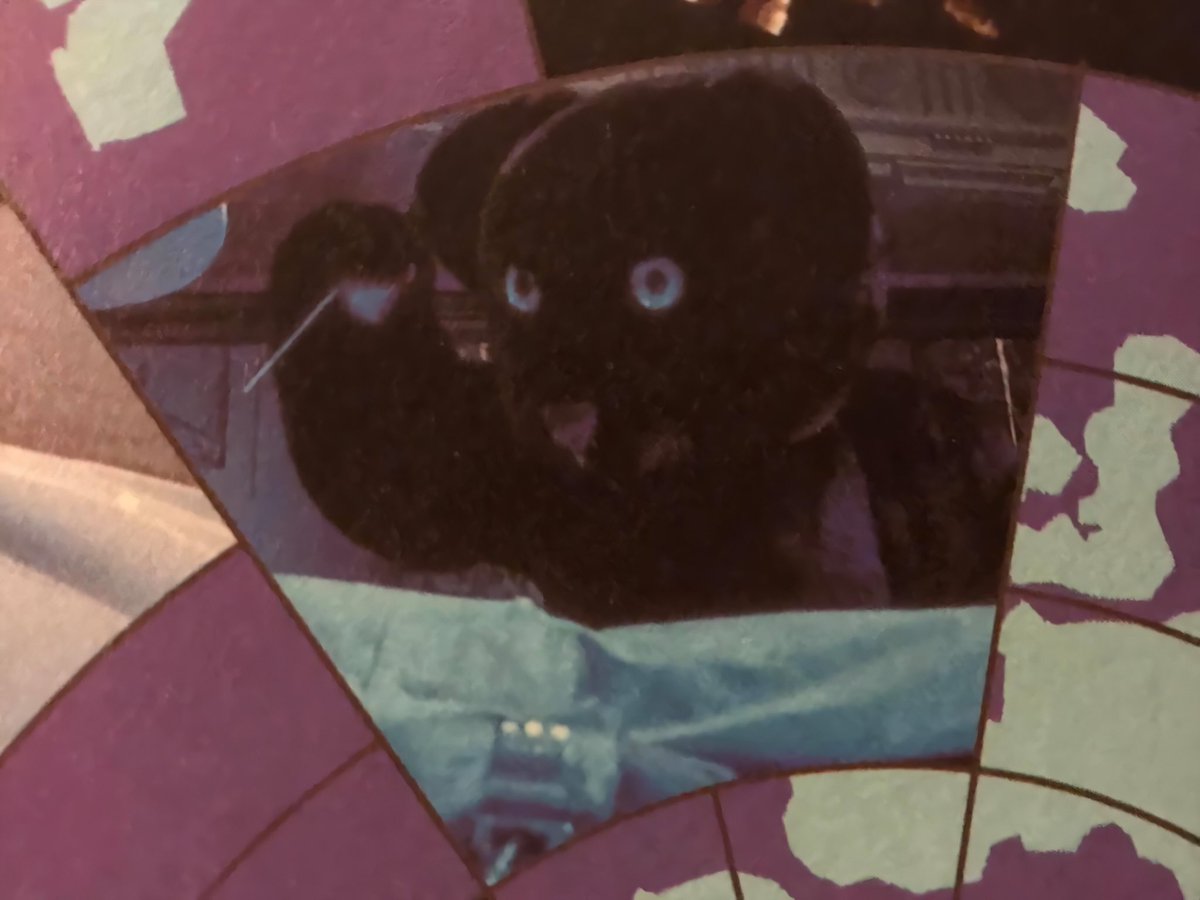 Sir August successfully gets the last secret (the relationship between protons and ions to cloud mass pressure). This information from the scientist is the key to Sir August making his own Prospero Program. At the crescendo of the aria, he plunges his staff into the scientist!