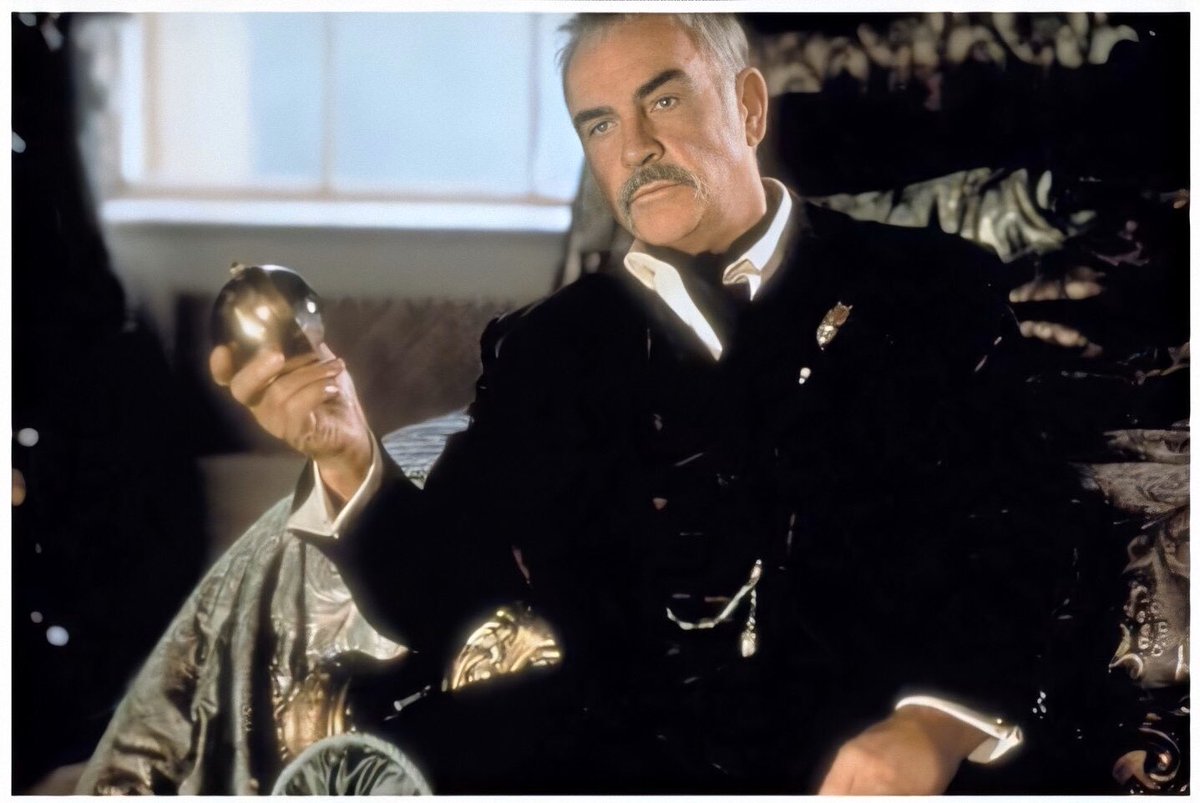 In this deleted scene, Sir August finds comfort in his boyhood clock whilst waiting for the countdown till the start of his own Prospero Program to bring the world to it’s knees.