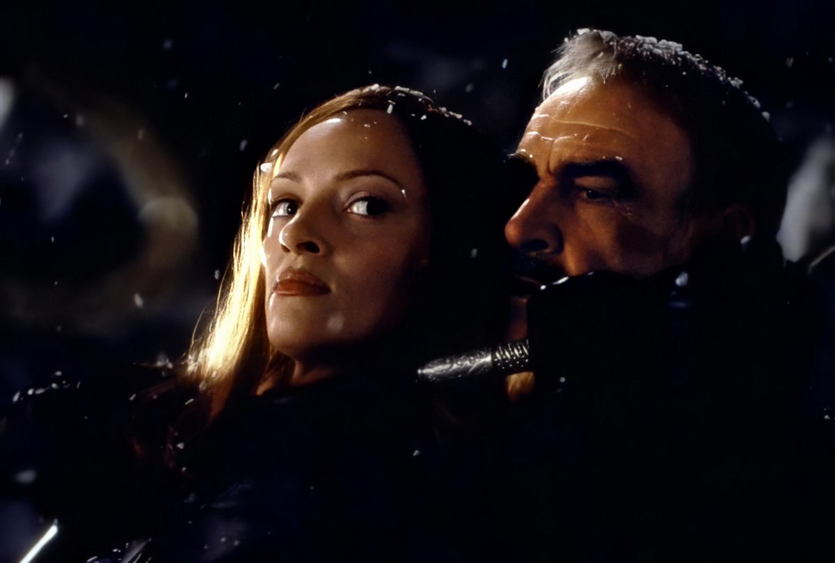 Shortly after Steed and Mrs Peel arrive on Serpentine Island (in their inflatable balls!) Sir August emerges from the shadows, grabs Emma, and threatens to kill her. But ends up releasing her. This explains her inexplicable unease before she and Steed crowd into the phonebox.