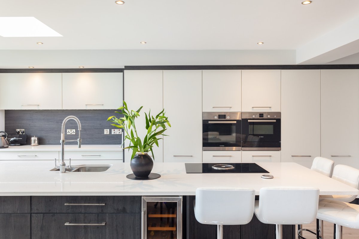 CelticInteriors's tweet photo. This thoroughly #modern #kitchen by @CelticInteriors is painted in Porcelain &amp; features MFC in Dark Wenge. This client also went for a state-of-the-art hob from @BORAGmbH. #interiorlovers #homeinspiration #homedesign #homeinspo #kitchendesign #irishmade #madeinireland🍀 https://t.co/qWqZPzkYOg
