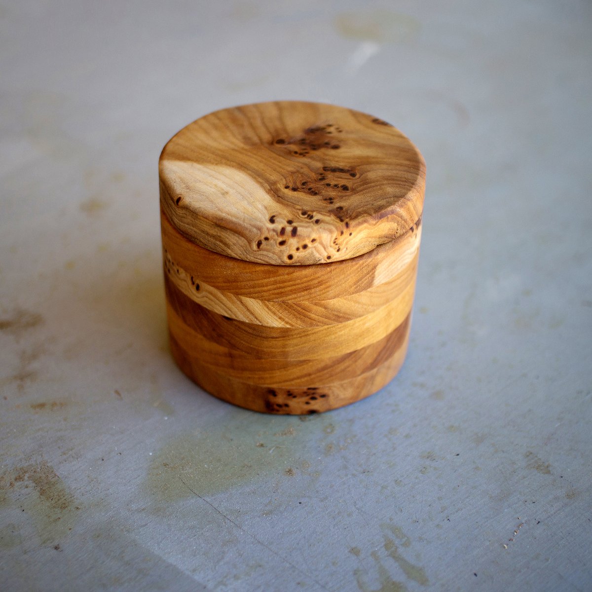 I made this cylinder box with elm and a router—it was a fun project, but I really need to get a lathe someday soon!

The process is detailed in the project plans online.