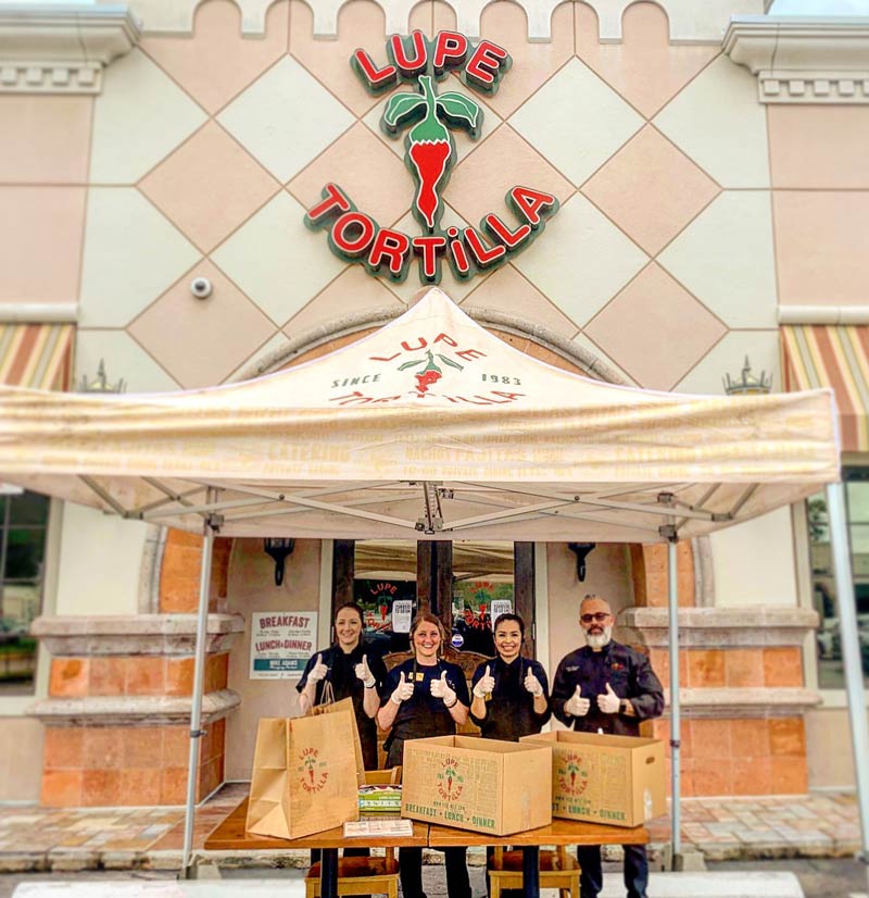 MVPVisuals's tweet photo. Our friends at @LupeTortilla  are working hard offering curbside pickup/takeout service, and we've supplied the custom pop up tents to help them do it! 👍🌮 Check out custom tent options for your business here: https://t.co/InW7OmHkxa https://t.co/LaR24Ckjfa