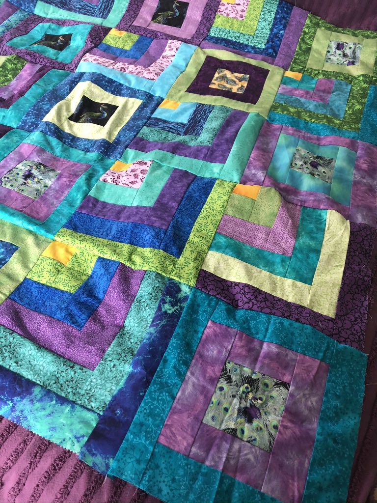 Fabrisia's tweet photo. Working on assembling my #peacock quilt.... https://t.co/ayOZeKb0Cu