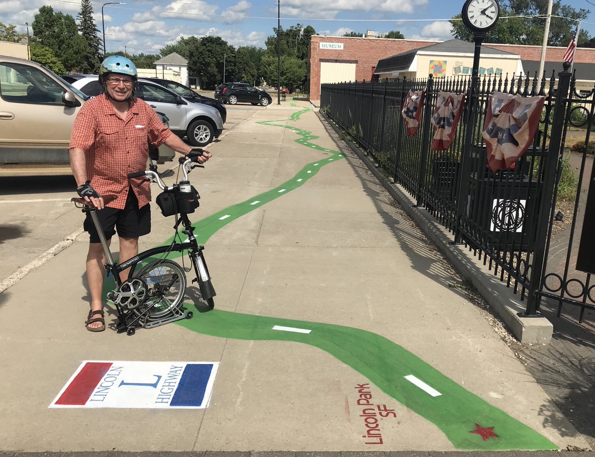 chuckoburger's tweet photo. Finished Day 4 of my Virtual ⁦@RAGBRAI_IOWA⁩ by riding all 3,389 miles of the Lincoln Highway. Actually, artist Roger Aegerter painted the Highway, in scale, on a 295-foot downtown sidewalk in Jefferson IA. #VirtuallyTheBest https://t.co/X93wKu9nJd