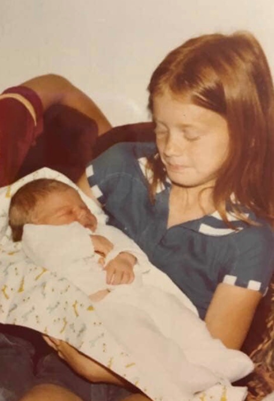 LColeran's tweet photo. @edcampMATH Holding my baby bro. 
#edcampMATH https://t.co/ZQ1kMx3snu