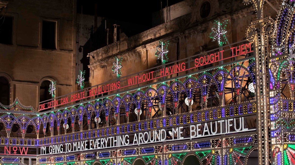 Dior's tweet photo. The Piazza del Duomo in Lecce is magically lit up with luminarie, a specialty of the Puglia region, and powerful text art by Marinella Senatore, ready to host the unveiling here and https://t.co/akWsXTLiKd of the #DiorCruise 2021 collection by Maria Grazia Chiuri at 8:45pm CET. https://t.co/ye4zsycuFo