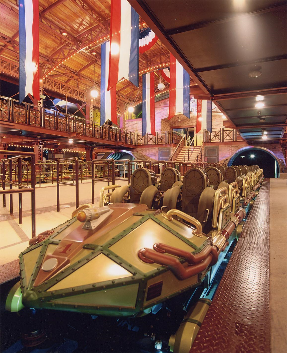 Imagineeirving's tweet photo. The marketting picture on the left was realised thanks to an actual vehicle shell of Space Mountain. However, a slight modification was made right before opening to make it suitable... Can you see it? https://t.co/5vVpUp9lS0