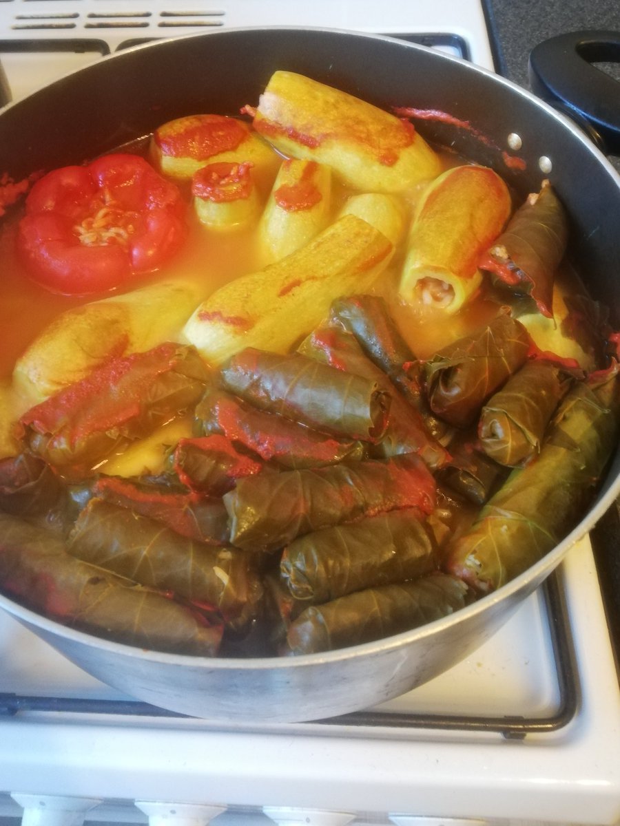 DrLayalHakim's tweet photo. Cored, stuffed and boiled. Now for the best part... #yummy #lebanesefood #vineleaves #stuffedcourgette #stuffedpepper https://t.co/uuKs90AqwS