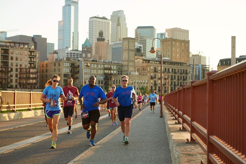 Torchlight5k's tweet photo. From the fiery start line through notable spots of downtown including the @Aquatennial parade route &amp; across the finish line to the post-race party, we're celebrating the memorable experience the live event has been over the years. What's your favorite part of the #Torchlight5K? https://t.co/vEaoFkTZF0
