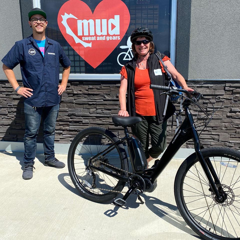 TourismRedDeer's tweet photo. We Visit Red Deer are excited to announce a new partnership in place with Mud, Sweat and Gears. Thank you to MacKenzie and Paul for helping us get Colleen back on the trails and throughout our city to promote our great area. #staytuned #explorereddeersbackyard #visitreddeer https://t.co/5b9X1SJvqF