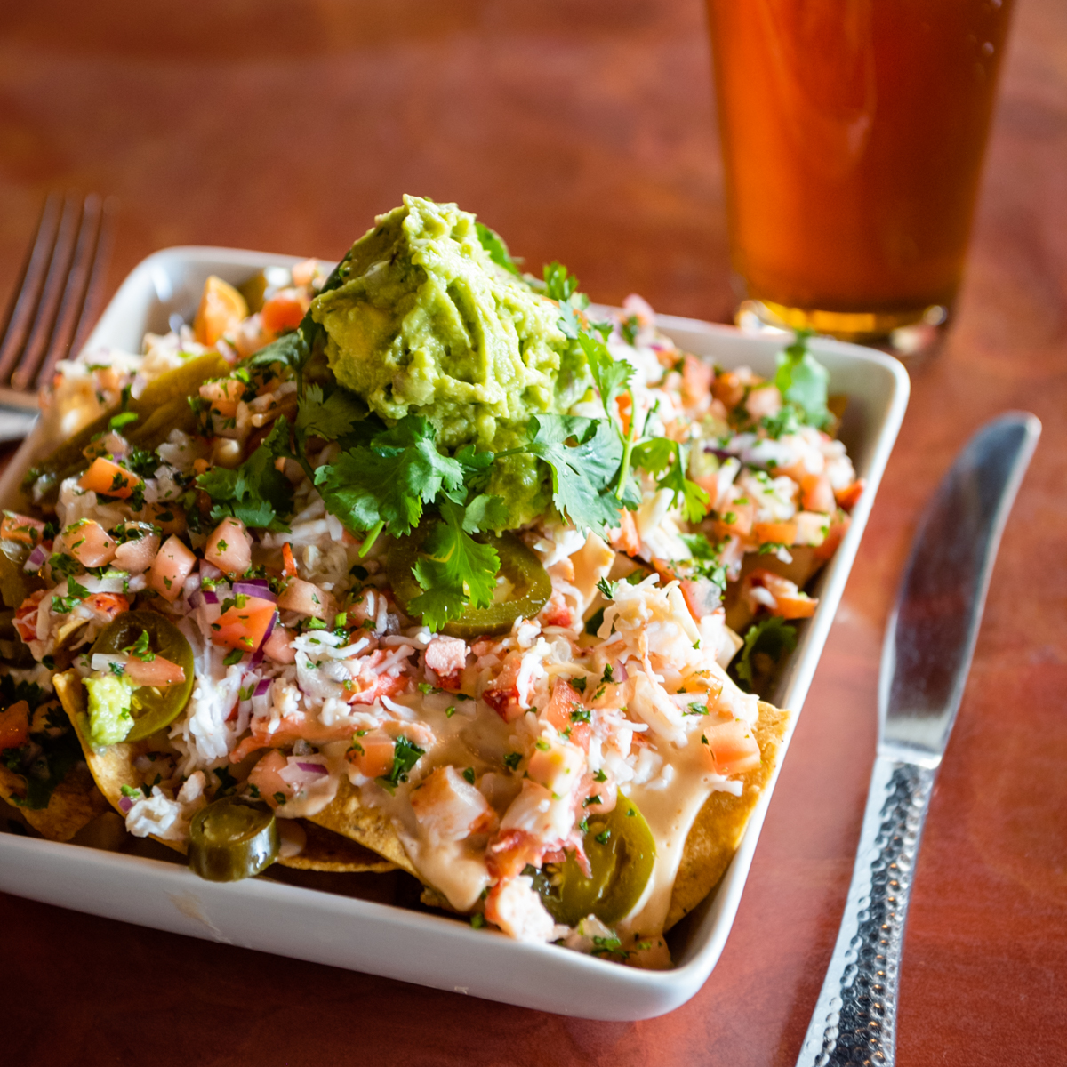 LiveAtSBG's tweet photo. Its lobster fest at Sound Bites. Besides fresh live Maine lobster we have killer crab n lobster nachos! Cold beer goes great with them.  #sedona #beer #open #nachos https://t.co/SH5cu9oYPz