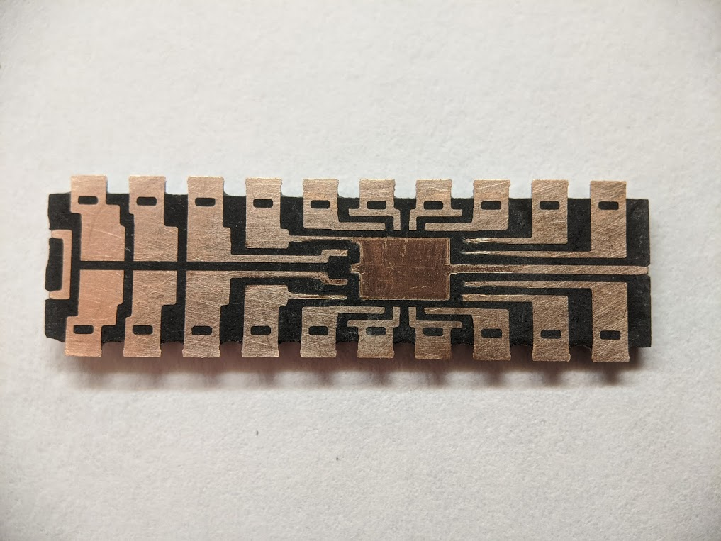 think that's amazing? check out the underside! this is the complex custom lead frame that connects those four capacitors to the chip.