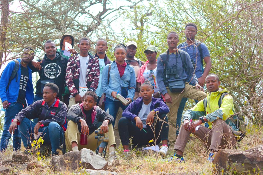 EcoMukuru's tweet photo. GAME (WILDLIFE) VIEWING  FASCINATES. The reason you are probably not fascinated by the wild animals like the birds in your backyard/garden is because you don't know the rules of the game (wildlife). A trip to Mkuru woodlands will change just that.

Students bird watching. https://t.co/5sXZ6VpgQK