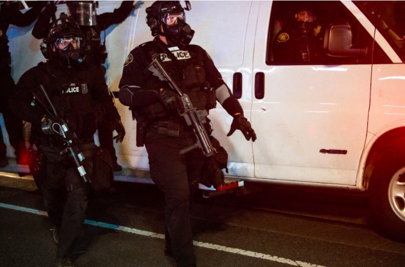 Portland PD in  #PortlandRiots using a Penn Arms GL-1 Compact 37mm and FN-303