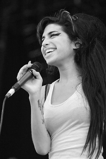 i know today is sad but here’s some photos of amy at her happiest #AmyWinehouse