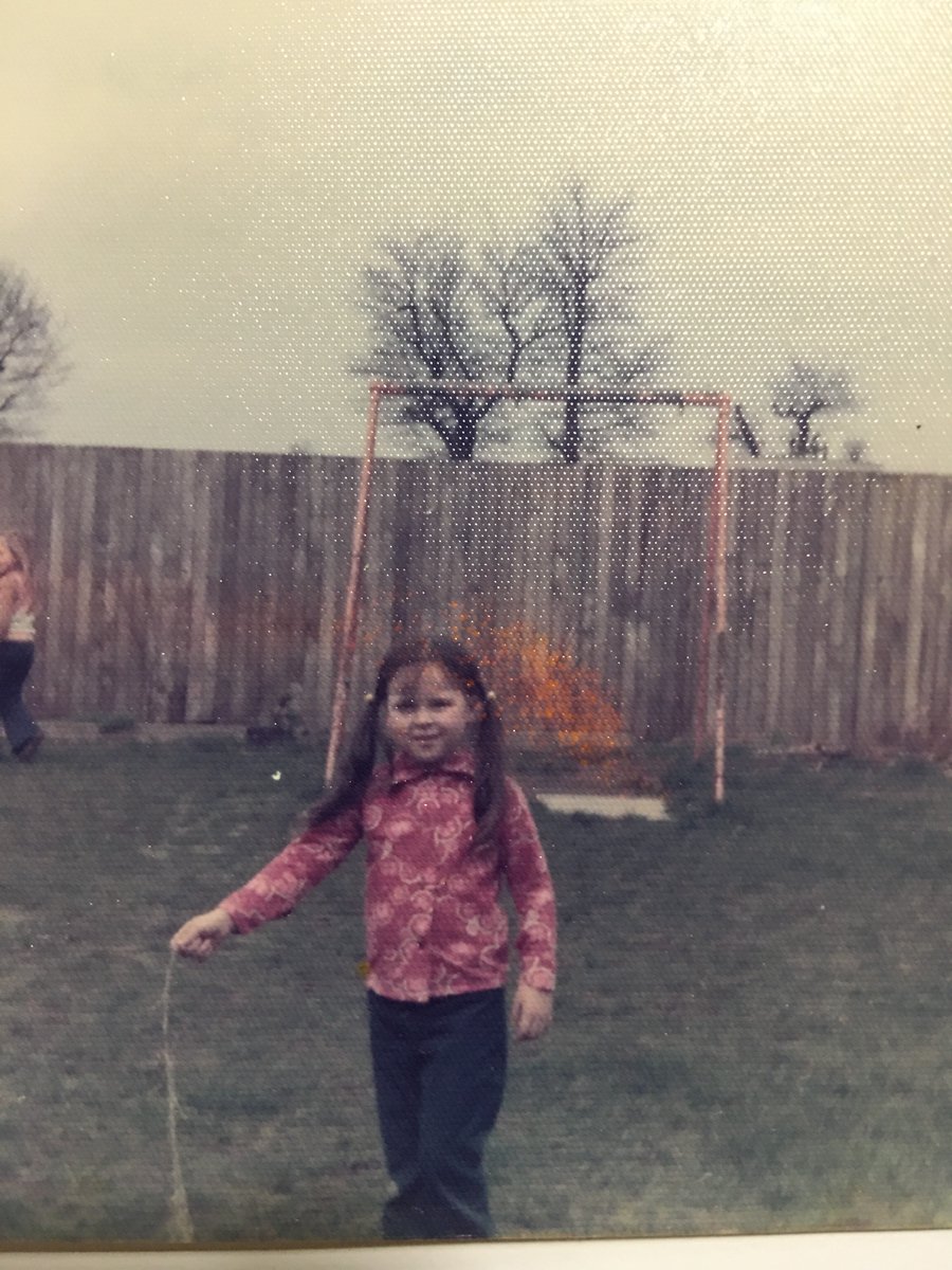 Here I am aged around 8, in the garden of our second home. Again it’s a council property but a house this time, not a flat. Things were getting better - we were still broke, but we had a little more space.