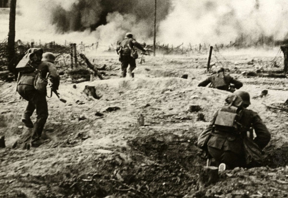 German Pioniere training, assaulting fortified positions. Note the differing webbing packs (to Infanterie) that contain explosive charges & specialist equipment. 1)