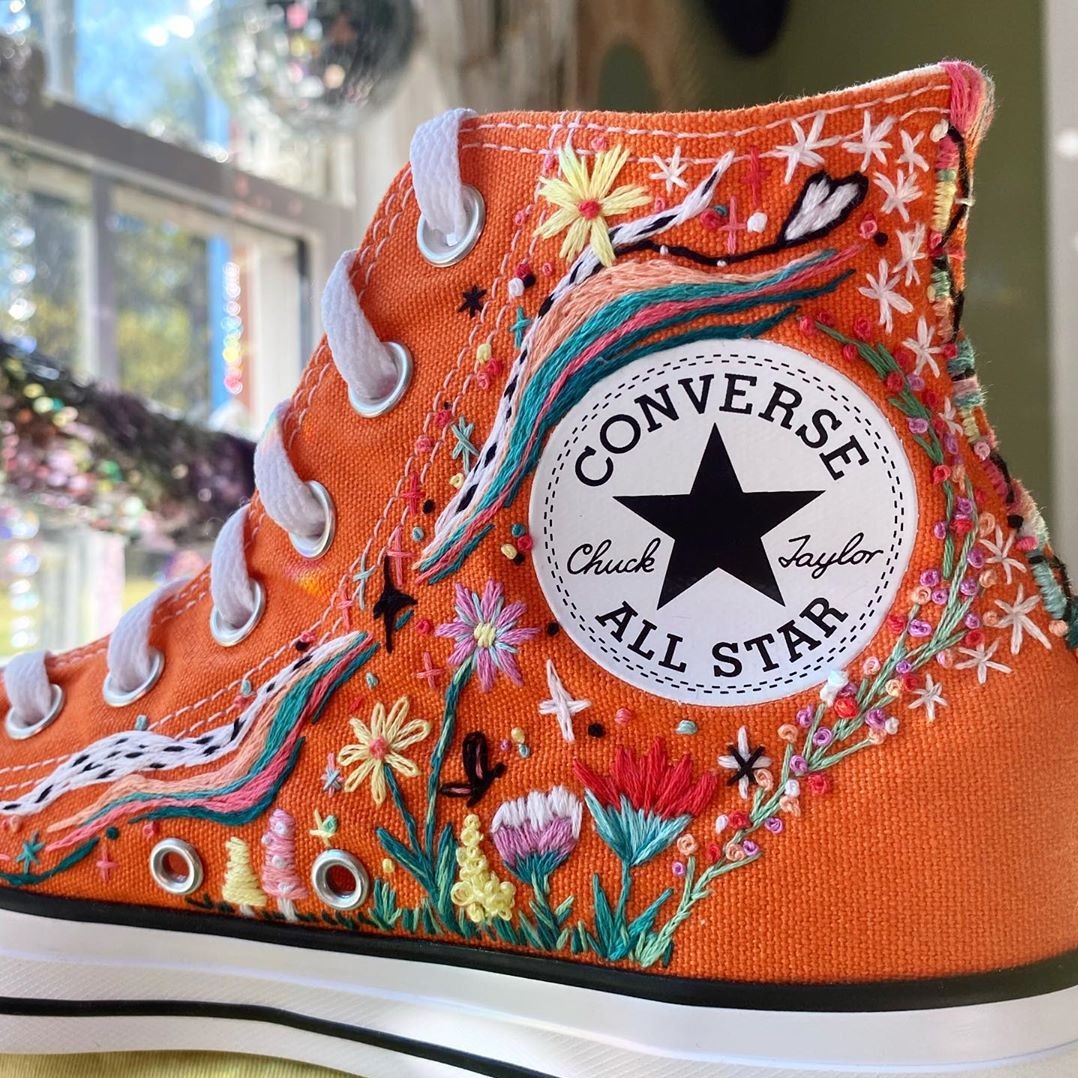 LondonEmbSchool's tweet photo. How fun are these colourful, hand embroidered Chuck Taylors! AJ from @nonakeddenim on Instagram uses thread to decorate shoes and clothing in floral motifs. https://t.co/dlTBnuxPNl
