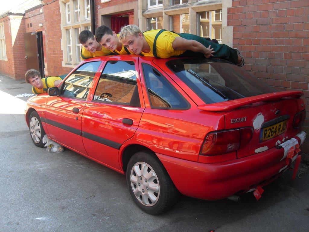 BablakeDT's tweet photo. The current successful @6FormBablake Advantage sessions developed from  extension lessons. #ThrowbackThursday this week revisits 2008 and DT based car maintenance. Here's some fine chaps taking a break to model and plank - remember that?? @bablakeschool https://t.co/ALX22LBTH9