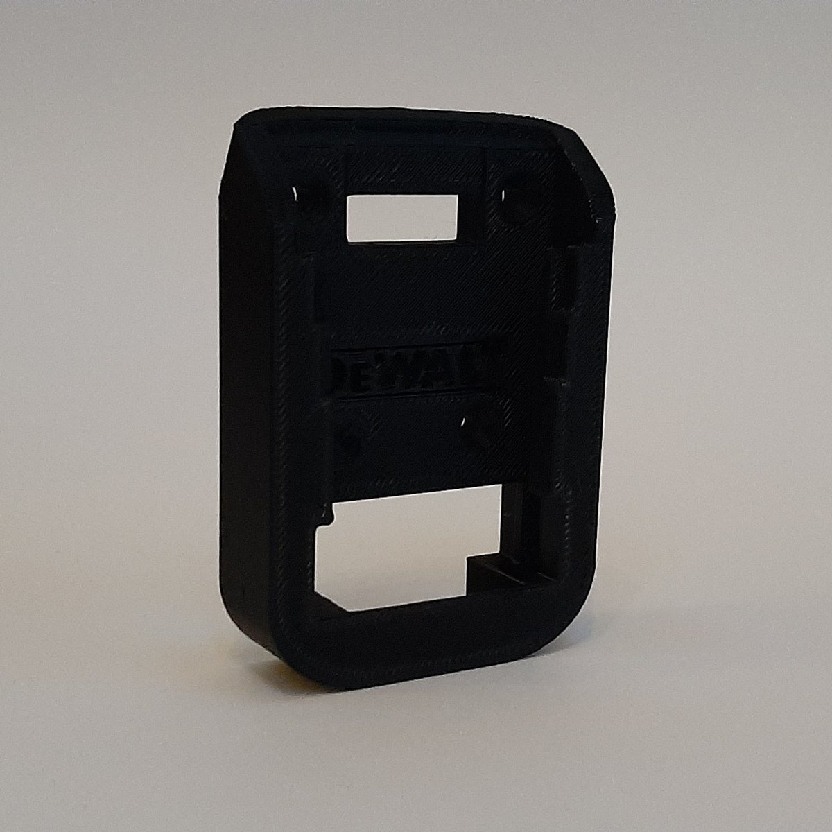 somtek3d's tweet photo. This is a #3Dprinted #DeWalt 18V battery holder. This battery holder can be mounted in a van or shop to store your DeWalt batteries when they aren't in use. 
We also sell #Mikita, #Milwaukee, and #Bosch Battery holders for power tools.
https://t.co/gzhXWuyA55 https://t.co/tsNaY5ht8d