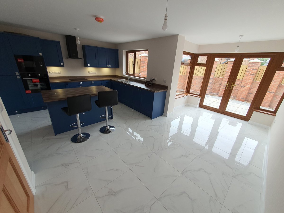 Kitchen with inbuilt microwave, oven, dishwasher, dryer/washing machine