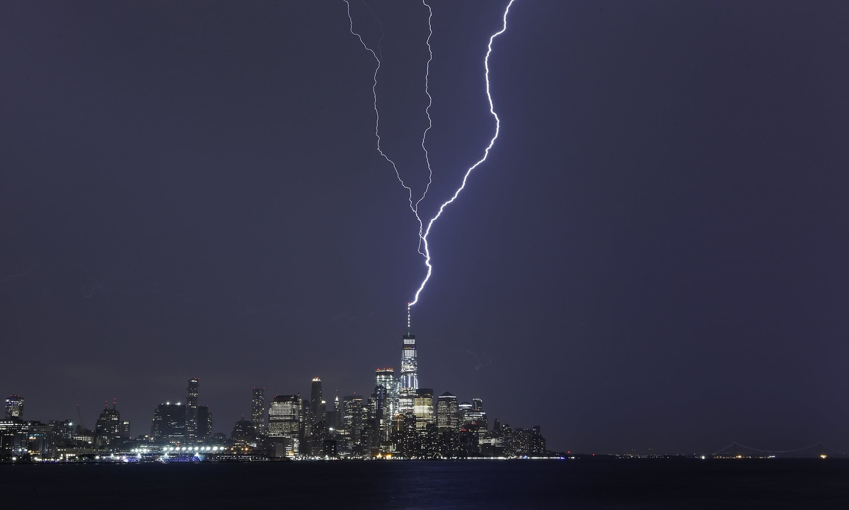 smarterbizpro's tweet photo. This is what we like to think happens when one of our consultants comes up with a client solution😉Stunning footage of lightning striking our New York office at One World Trade Center last night. 
https://t.co/IvcCFhHg8J https://t.co/Q02dd3BRyi