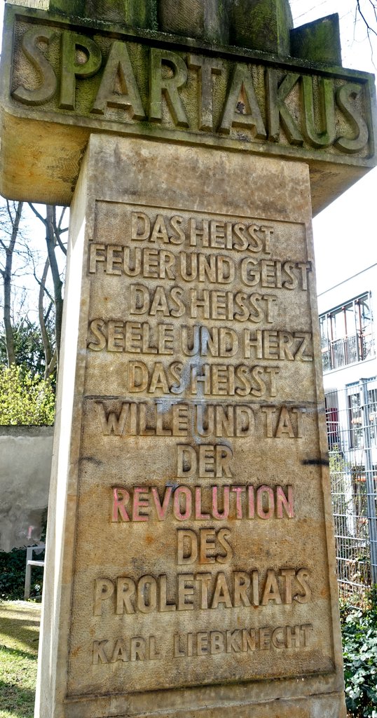 67a\\ Another memorial related to Rosa Luxemburg is the “Spartakus Stele”, located where Karl Liebknecht’s law office stood. Here, on January 1, 1916, the first (illegal) Reichskonferenz of the Gruppe Internationale took place, which afterwards became known as Spartakusgruppe.