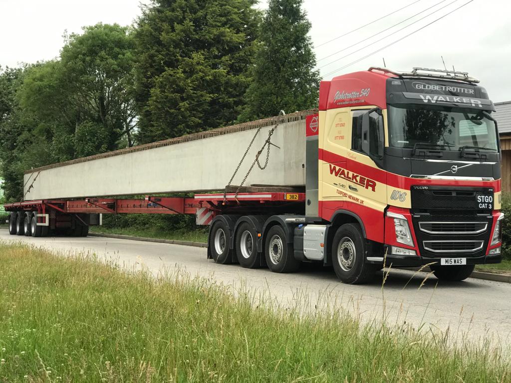 Walker_Tuxford's tweet photo. 30 Meter Long x 60 Tonne precast concrete bridge beam with @Walker_Tuxford & @ABMPrecast #volvotrucks #heavyhaulage #trucks #truckporn #truckdrivers #trucksofinstagram #trucking #truckingindustry #abnormalload #keyworkers #haulage #extendabletrailer #longload #haulagecompanies https://t.co/E91RS18UnC
