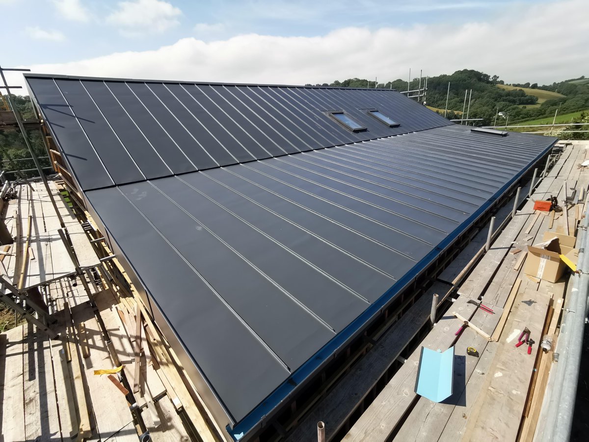 A nice 275m2 barn conversion with a pitch change detail finished off. The client chose Greencoat PLX in Mountain Grey. #barnconversion #metalroof #plx #metal #roof #amr #roofer #specialistroofing