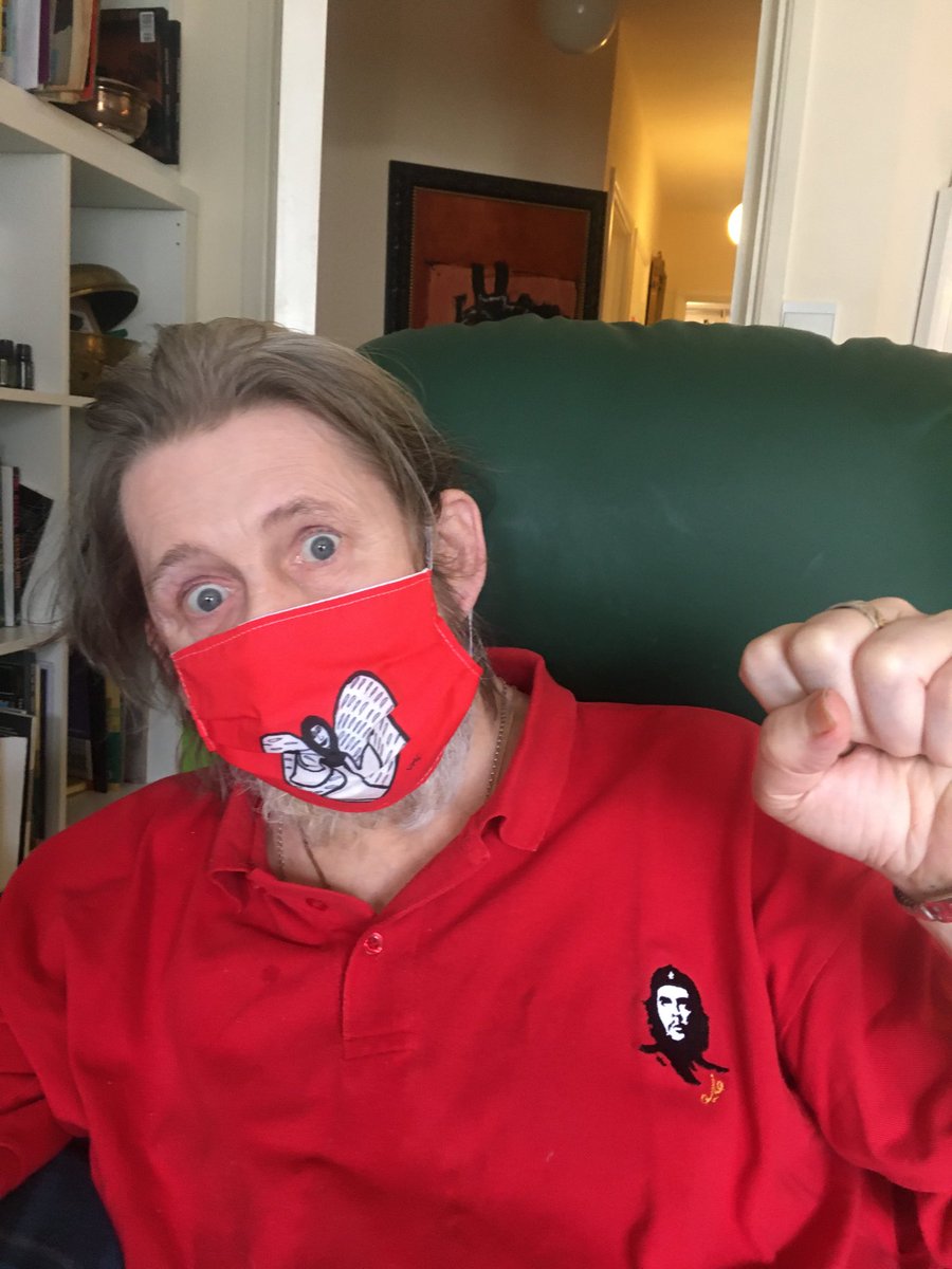 Victoriamary's tweet photo. Shane modelling the Gaelitrea mask, it matches the shirt! #shanemacgowan #pogues #facemask #angelmask https://t.co/ap0MpOMPWN https://t.co/YZMP75ypKA