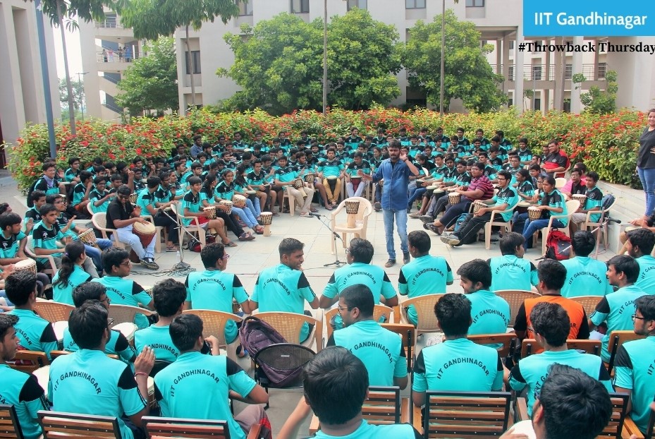 iitgn's tweet photo. Throwback to the times when social distancing was not the “normal”. This picture from 2017 brings back the memory, the fun that the then BTech freshmen had during a session by ‘The Drum Circle’ as part of IITGN’s Foundation Programme.
#ThrowbackThursday #TBT #FP2017
@fpiitgn https://t.co/sZA89MKE0z