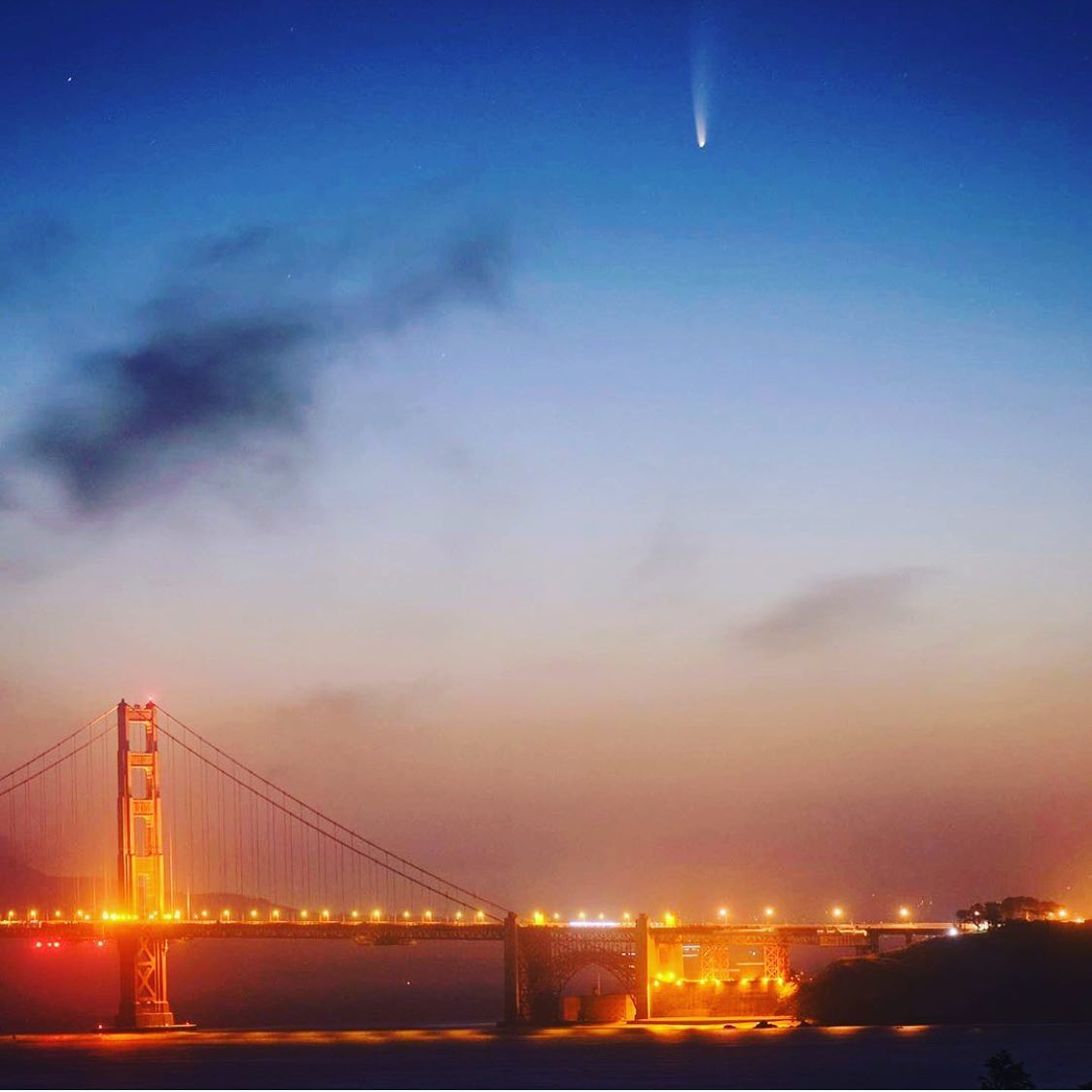 GGBridge's tweet photo. Did anyone spot the #neowise comet over the Golden Gate? Thanks @moshen and @sfgate for this stellar early morning shot. #comet #neowise #sfgate https://t.co/Jhg02bEsNl