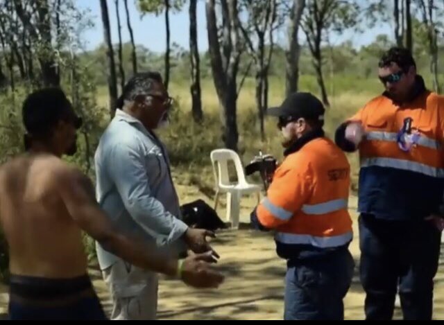 Petitioner007's tweet photo. @byetofi @justinrfield @denniallen @SantosLtd De jávù. Same scene Qld. Foreign National Adani’s thugs stopping #FirstNations #WanganJagalingouFamilyCouncil Elder #AdrianBurragubba & his son Cory from going on their own country. Adrian can’t go there. Or leave Aust. Because corrupt Adani bankrupted him. Heinous #InvasionWars. https://t.co/DT8TuMcKDU