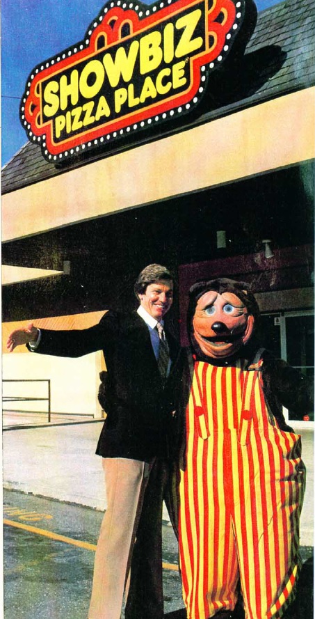 This is Brock with the animal "Billy Bob Brockali" - "a large bear with an ironic smile" (I promise I'm not making this up).Fechter even becomes a partner in his company. His animal band is called the Rock-afire-Explosion.