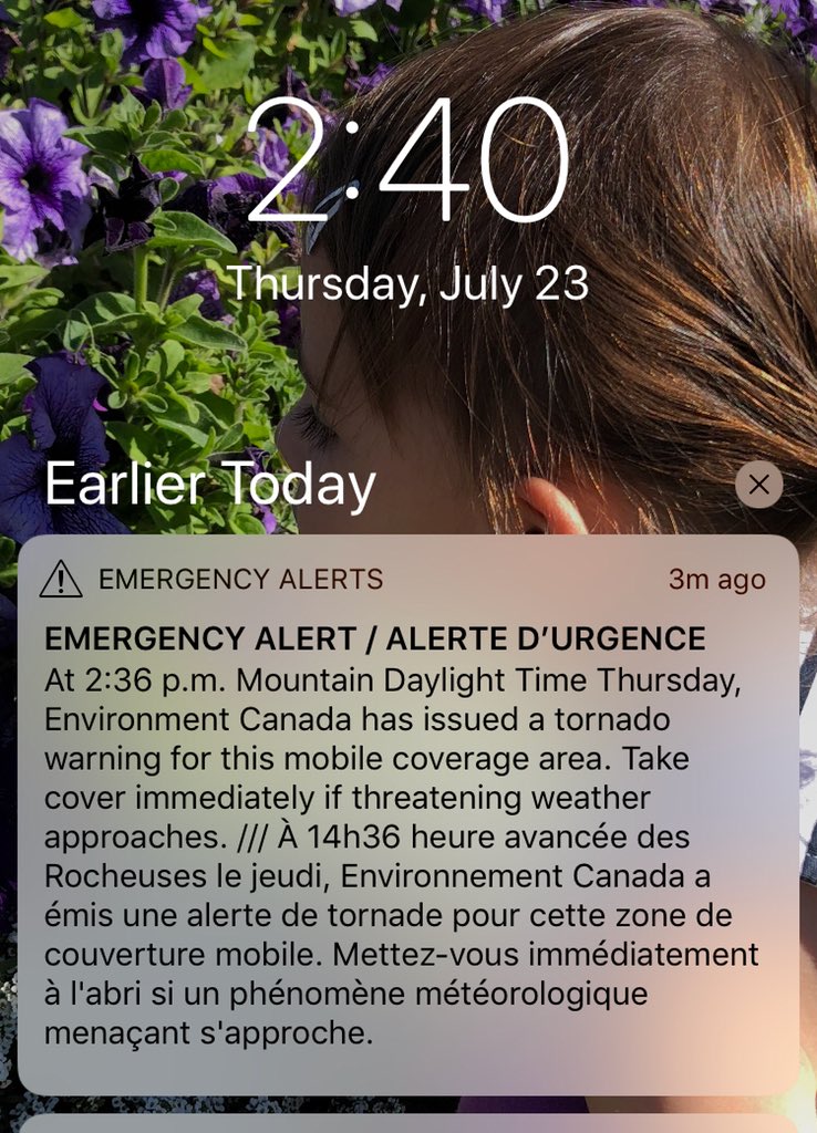 Danayemaier's tweet photo. Heads and eyes up! Tornado Warning issued for #calgary and #Airdrie. Thunder and light rain in #CoventryHills #NorthCalgary right now. #AbStorm #Yycstorm https://t.co/MdWT0foaXI