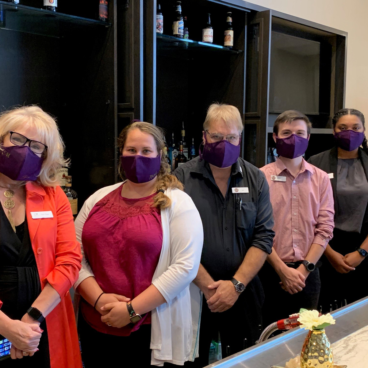 We decided to take our facemasks to the next level - handcrafted by one of our team members in purple and gold of course! #jmunation #godukes #team #covid-19 #hotellife #harrisonburgva #visitva #besthotel #teamwork #teammadison