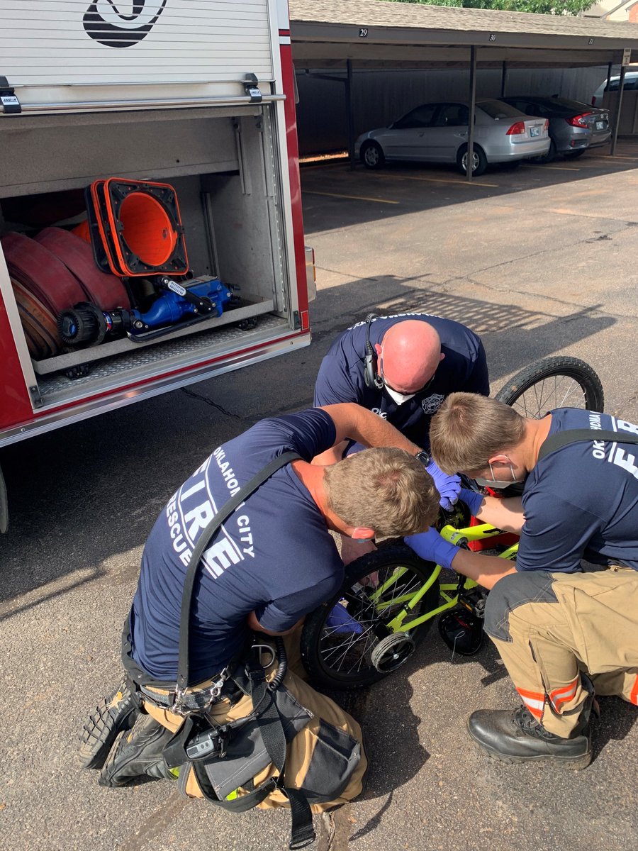 OKCFD's tweet photo. The crew from Engine 3 ran on a medical call today. While there, they noticed a bicycle in the corner of the house. The child said it was broken and no one could fix it. Operation "Fix The Bike" began. The firefighters had the happy kiddo rolling again in no time. #Community https://t.co/VNwG9kne0R