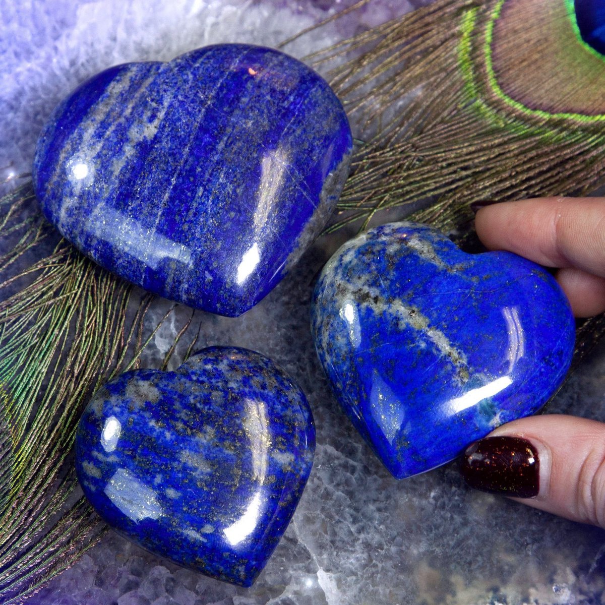 lapis lazuli - deep, dark blue - associated with third eye chakra - aids in stimulating higher knowledge, wisdom & judgement - can be used to help protect against psychic/spiritual attacks - aids in self-expression: helps to speak ones truth- bring harmony to friendships