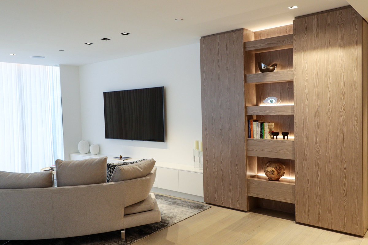 DavilaWoodwork's tweet photo. Right by the water, this Miami Beach apartment features Plank Silver Gray Oak paneling and White Satin finished cabinetry. Beautifully designed by designer Carol Deane 
from Interior Lab Studio! https://t.co/RLDj4mFxrx