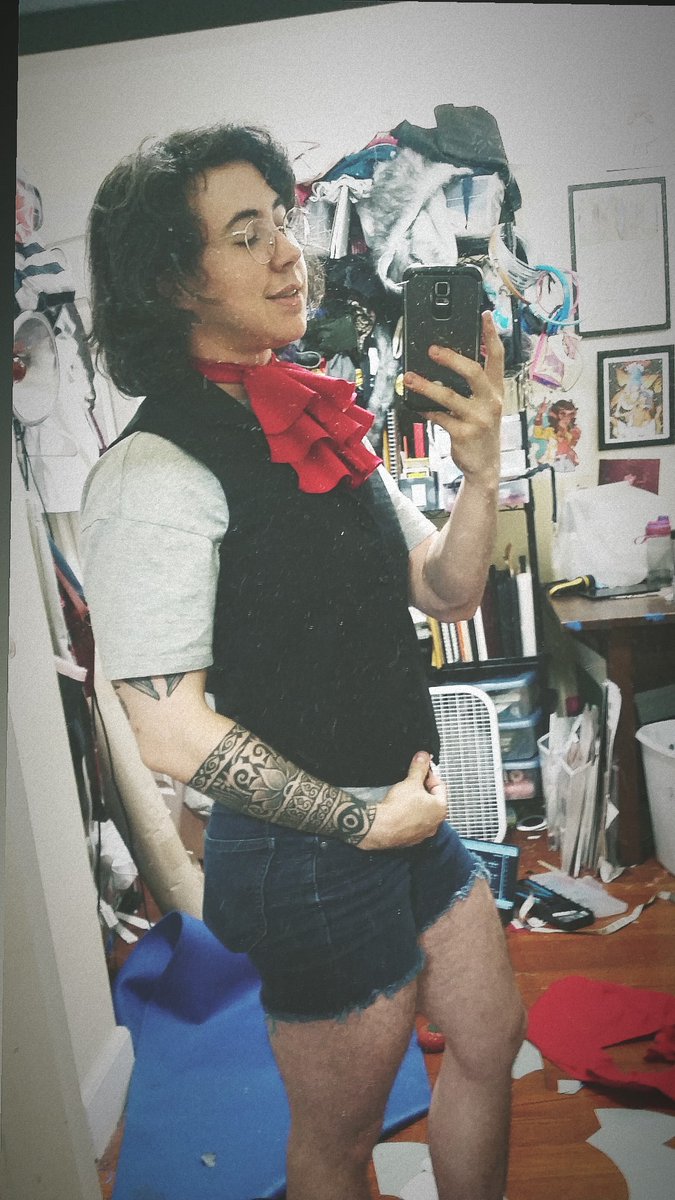 Cravat mock up #1, just to test size/shape. It's a tiny bit big but it I use this as my cut line on the real thing the seam allowance will make it perf I think. Offending "vague curves" included lol.