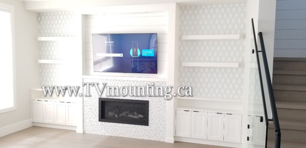 ShaneEkeli's tweet photo. Cheers to the new beginnings for our client in Coquitlam. TV was installed over fireplace in brand new house. https://t.co/rXrRhwWrzW